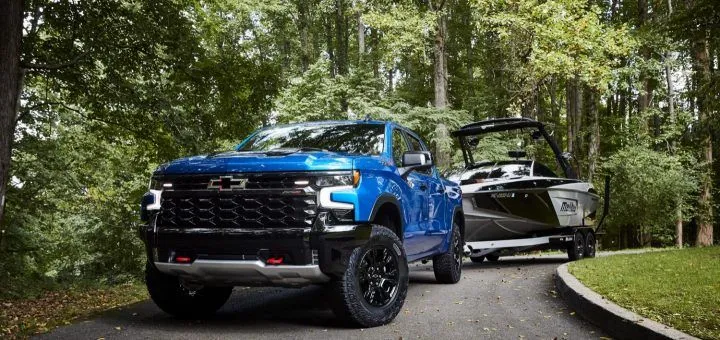 2022-Chevrolet-Silverado-ZR2-1500-Launch-Photos-Exterior-003-front-three-quarters-towing-boat...jpeg